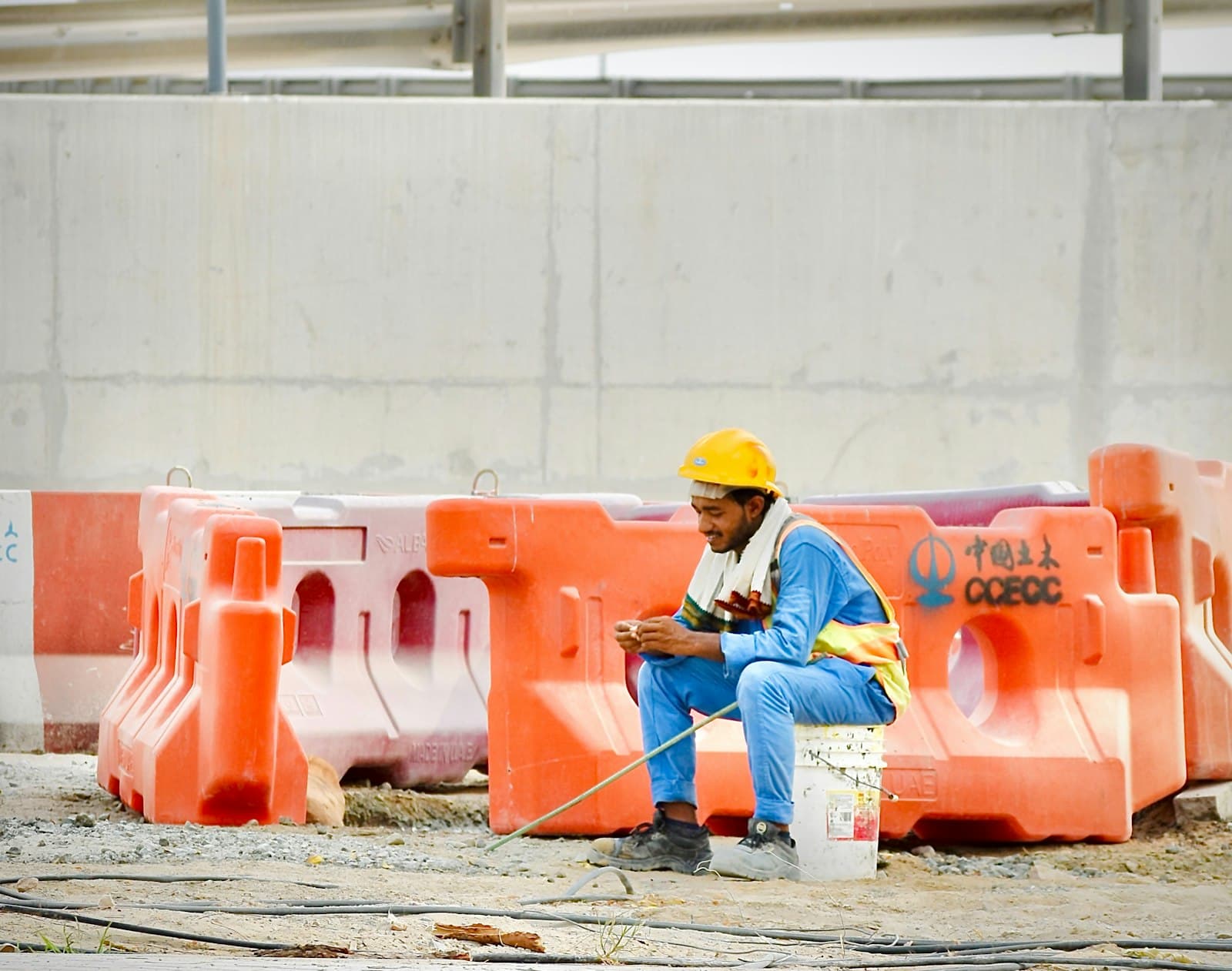 Construction worker in hi-vis on a building site